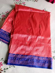 Vibrant pink orange Saree with Blue Border