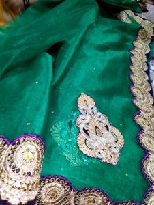 Elegant Green Saree with Gold Embroidery