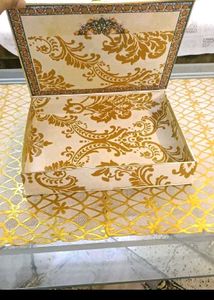 13. Decorative Gift Box with Floral Accent