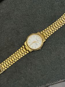 Sonata Gold Watch