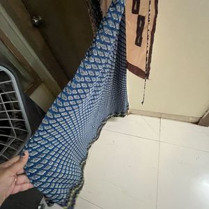 Stylish Sleeveless Kurti with Unique Pattern