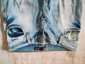 Ripped Light Wash Denim Jeans