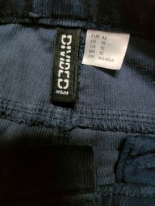 H&amp;M Flared corduroy NAVY BLUE trousers