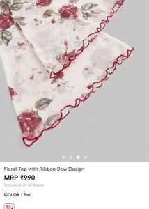 floral top with ribbon design- NOT WORN EVEN ONCE