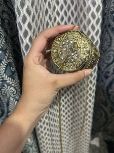 Elegant Gold Embellished Clutch Bag