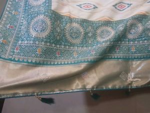 Elegant Saree with Intricate Border