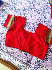Vibrant Red Saree with Golden Border