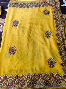 Exquisite Yellow  heavy Embellished Saree