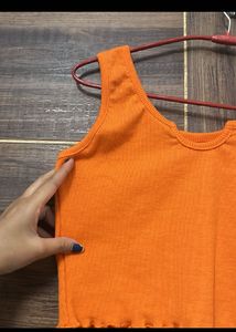 Vibrant Orange Ribbed Lettuce Hem Top
