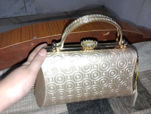 Elegant Gold Embossed Clutch Bag