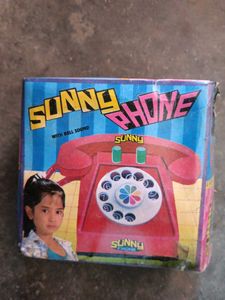 Vintage Pink Toy Rotary Phone