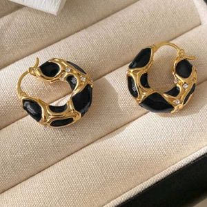 Chic Gold &amp; Black Hoop Earrings