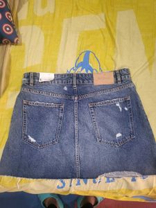 Distressed Denim Mini Skirt with Zipper