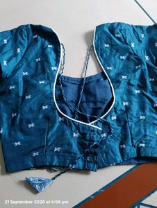 Elegant Teal Saree with Intricate Designs
