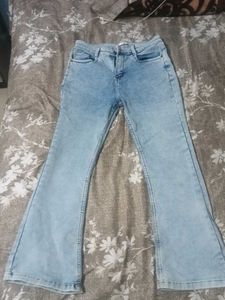 Light wash Boot cut low rise jeans for Women.