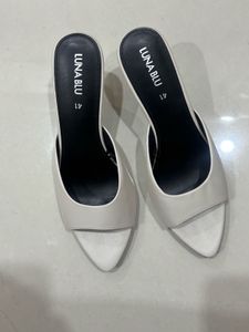 Elegant White Heeled Mules