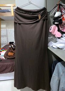 Elegant Brown Maxi Skirt with Brooch Detail