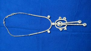 Price drop Sleek White stone pendant set