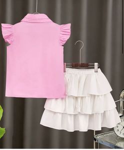 pink shirt with white skirt