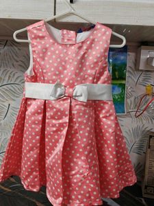 Cute peach Pink Polka Dot satin frock with Bow