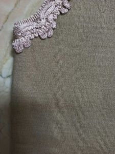 Sleeveless Sweater With Delicate Lace Trim