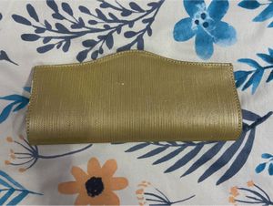 Elegant Gold Clutch with Embellishment