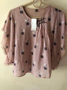 Chic Floral Print Top with Embellished Neckline