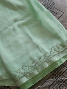 Elegant Mint Green Embellished Saree