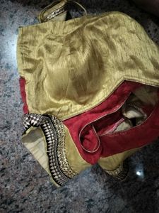Elegant Red Saree with Embellished Border