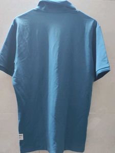 descente pastel blue polo t shirt