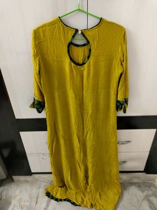 Stylish Yellow Kurti with Tassel Detail