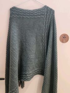 Stylish Knitted Poncho with Fringes