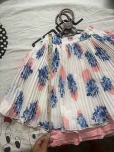Puff-Sleeve Tee + Floral Pleated Skirt