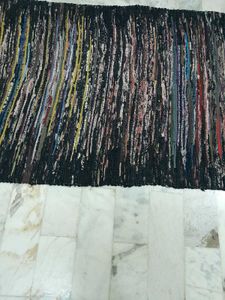 Woven floor mat