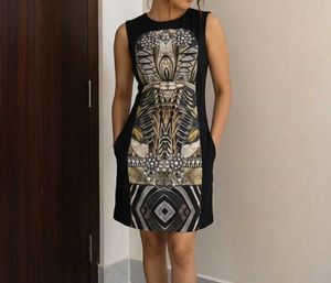 sleeveless sheath/ mini dress