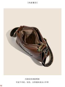 Embossed Elephant Sling Bag