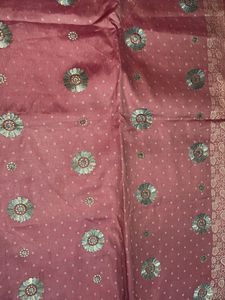 Elegant Pink Saree with Floral Motifs