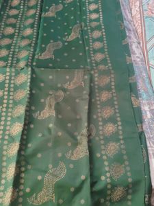 Elegant Green Saree with Peacock Print