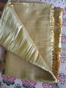 Elegant Gold Striped Fabric with Tassel Trim