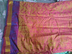 Elegant Pink Saree with Floral Motifs