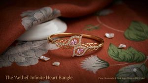 Elegant Pink Sapphire & Diamond Bangle