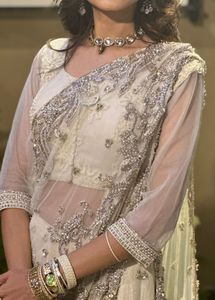 Elegant Off-White Embellished Lehenga Choli