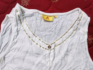 Branded White Maxi Dress. Has Beautiful Design On The Neck And Bottom Portion. Extremely Soft Material.