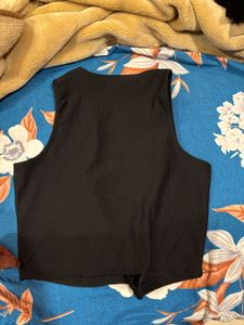Sleek Black Sleeveless Button-Up Top
