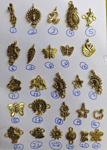 Assorted Antique Gold Tone metal Charms 6 pieces.