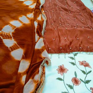 Elegant Embroidered unstitched suit, dress materia