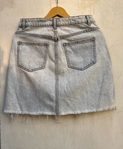 Ripped Denim Mini Skirt