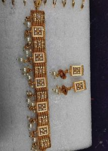 Elegant Gold Toned Necklace with Earrings