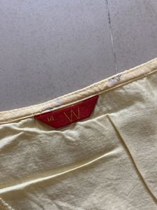 Elegant Yellow Kurta with White Embroidery