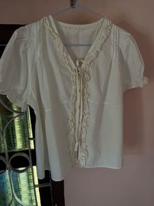 Cream Ruffled Button-Up Blouse